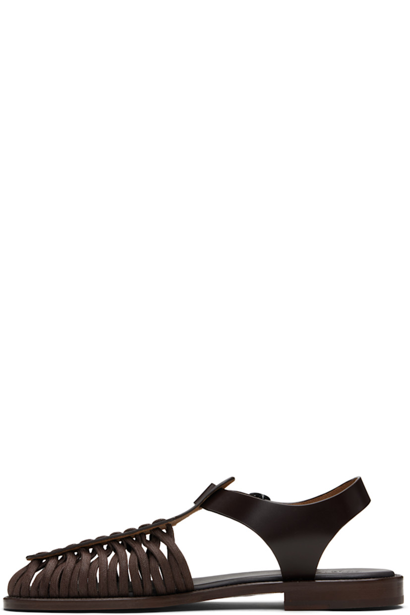 Handcrafted buffed calfskin sandals.

· Cotton lacing at square toe
· Pin-buckle ankle strap
· Logo-embossed padded calfskin footbed
· Stacked calfskin heel
· Calfskin sole

Supplier color: Dark brown