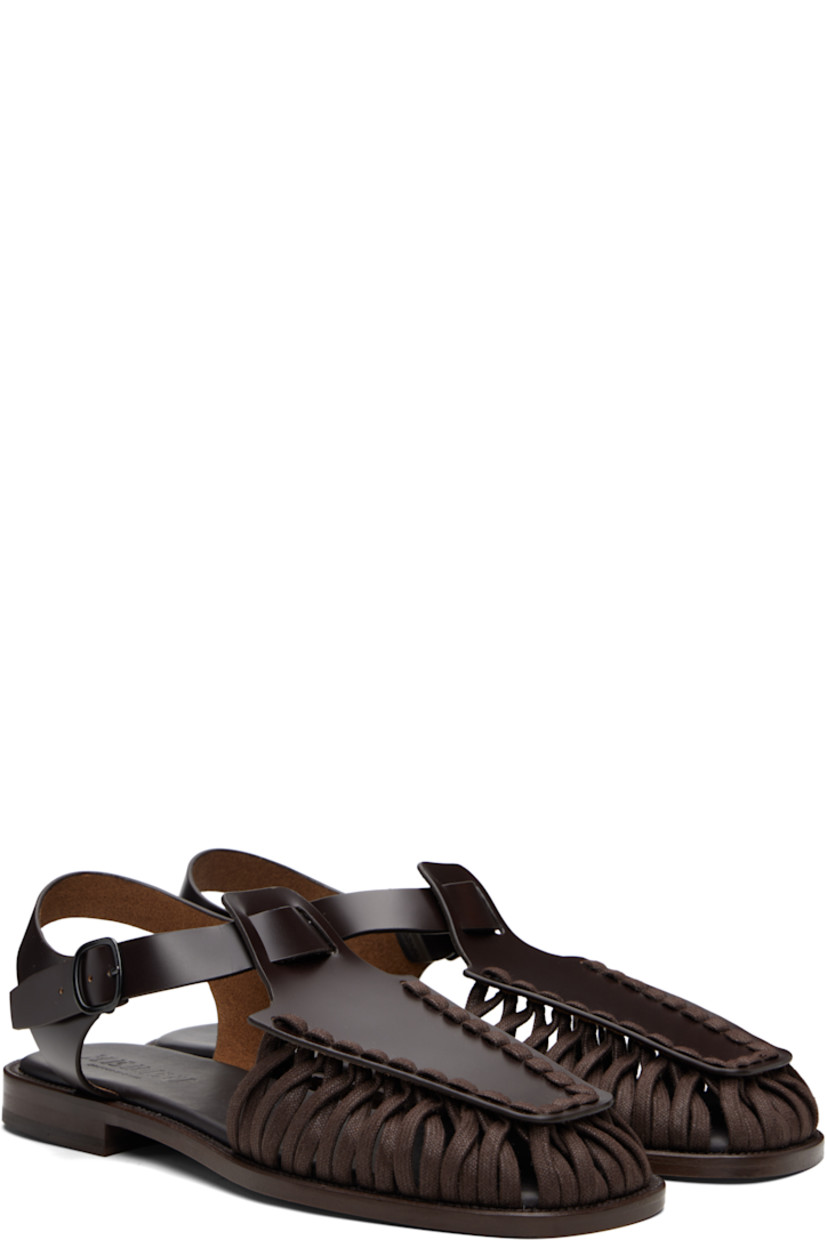 Handcrafted buffed calfskin sandals.

· Cotton lacing at square toe
· Pin-buckle ankle strap
· Logo-embossed padded calfskin footbed
· Stacked calfskin heel
· Calfskin sole

Supplier color: Dark brown