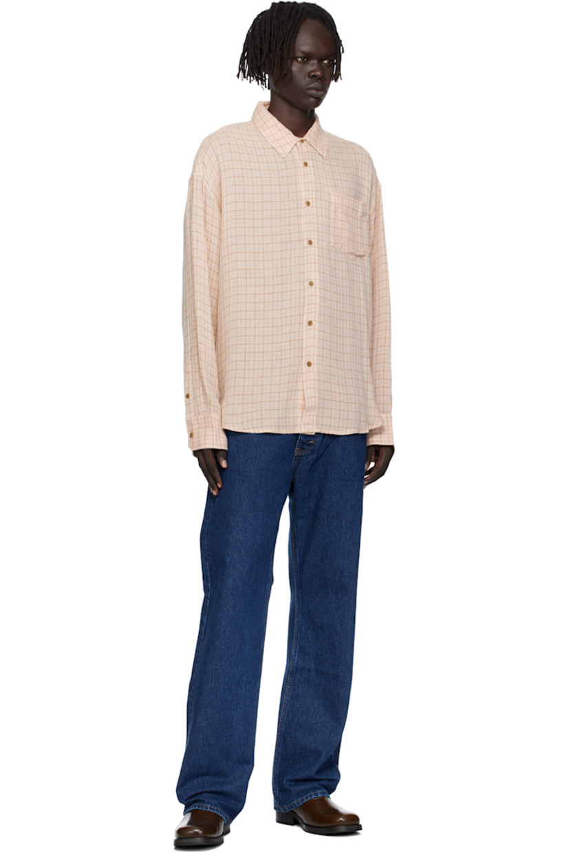 Viscose-blend flannel shirt.

· Check pattern throughout
· Spread collar
· Button closure
· Patch pocket at chest
· Shirttail hem
· Dropped shoulders
· Adjustable buttoned barrel cuffs
· Box pleat at back yoke
· Corozo hardware

Supplier color: Airy pink check