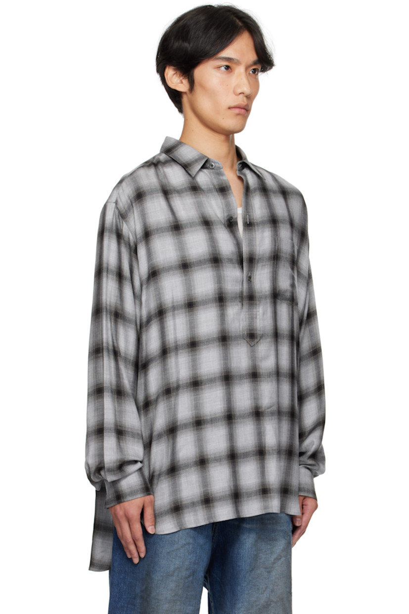 Lyocell-blend flannel shirt. 

· Check pattern throughout 
· Spread collar
· Three-button placket
· Shirttail hem 
· Pleats at buttoned barrel cuffs
· Box pleat at back yoke 

Supplier color: Black ombre