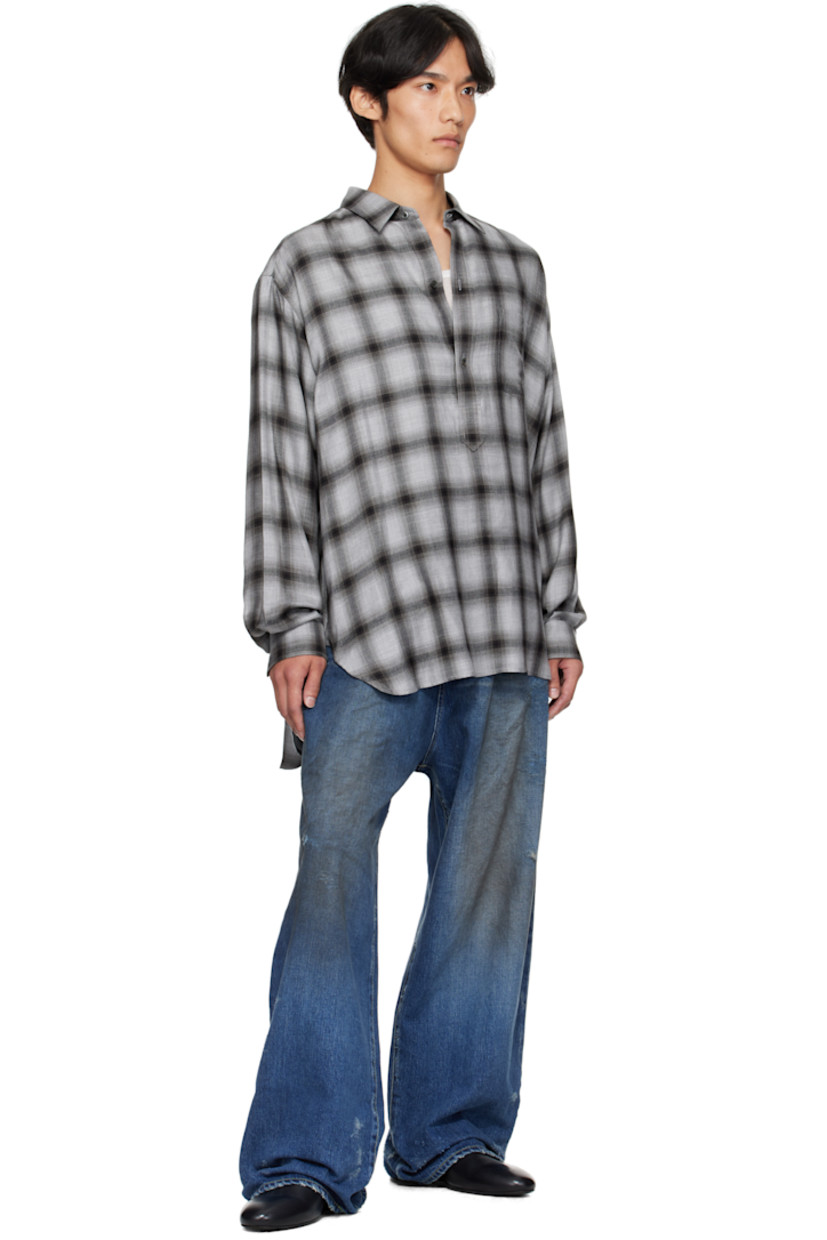 Lyocell-blend flannel shirt. 

· Check pattern throughout 
· Spread collar
· Three-button placket
· Shirttail hem 
· Pleats at buttoned barrel cuffs
· Box pleat at back yoke 

Supplier color: Black ombre