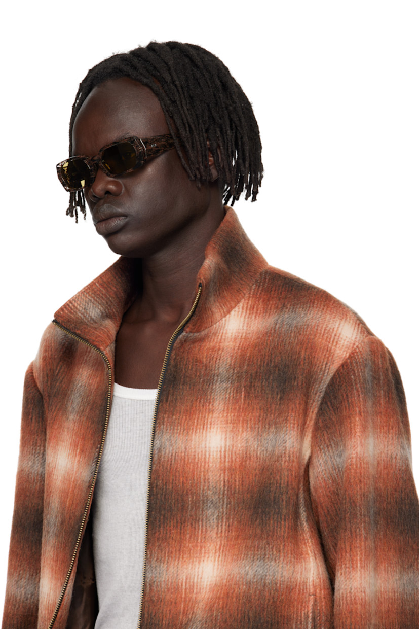 Rectangular semi-transparent tortoiseshell acetate-frame sunglasses.

· Khaki lenses
· Integrated nose pads
· Logo hardware at temples
· Core wires
· Includes pouch
· Size 54.20 145

Supplier color: Strambo