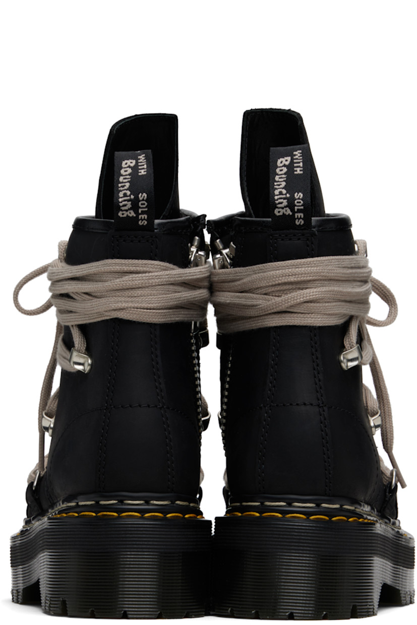 Ankle-high buffed leather boots.

· Wraparound lace-up closure
· Extended tongue
· Zip closure at inner side
· Pull-loop at heel collar
· Yellow stitching at heat-sealed Goodyear welt
· Treaded Air Cushion rubber platform sole
· Platform: H2"

Part of the Rick Owens x Dr. Martens collaboration.

Supplier color: Black