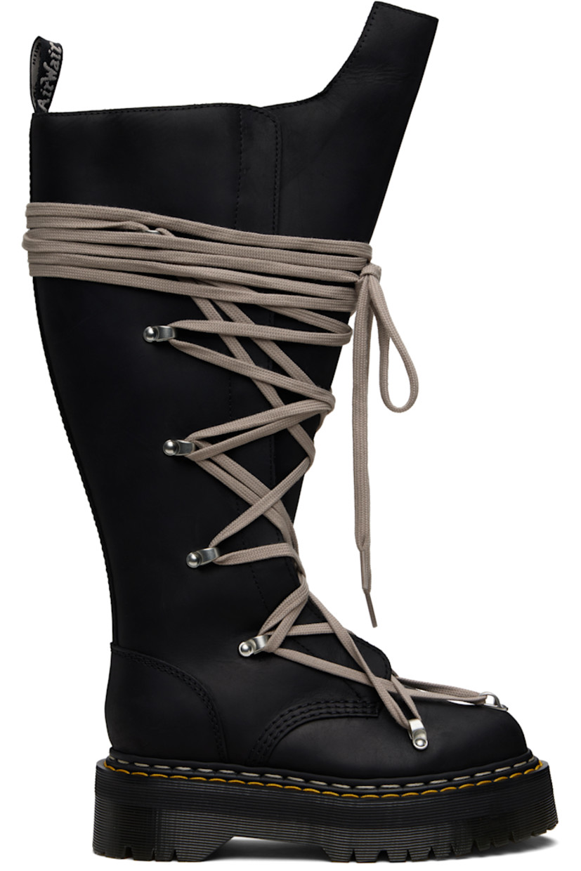 Knee-high buffed leather boots.

· Wraparound lace-up closure
· Extended tongue
· Pull-loop at heel collar
· Zip closure at inner side
· Yellow stitching at heat-sealed Goodyear welt
· Treaded Air Cushion rubber platform sole
· Platform: H2"

Part of the Rick Owens x Dr. Martens collaboration.

Supplier color: Black