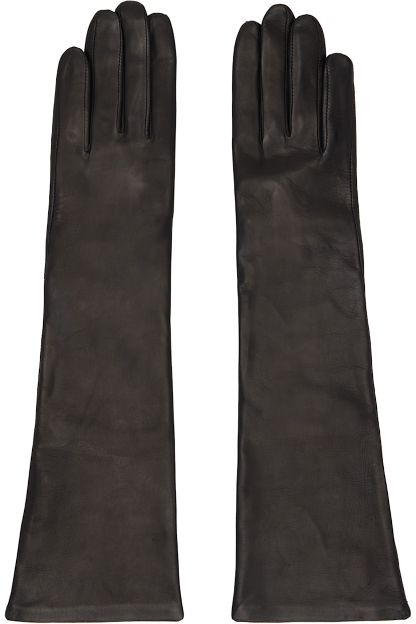 Grained nappa leather gloves.

· Partially elasticized wrist
· Embossed logo at cuffs
· Full silk jersey lining

Supplier color: Black
