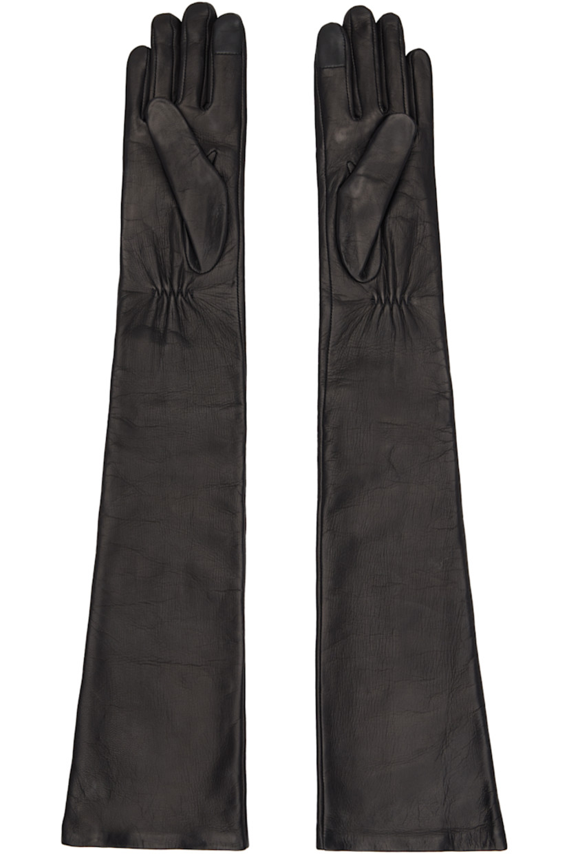 Grained nappa leather opera gloves.

· Elbow-length
· Partially elasticized wrist
· Logo hardware at cuffs
· Full silk jersey lining

Supplier color: Black