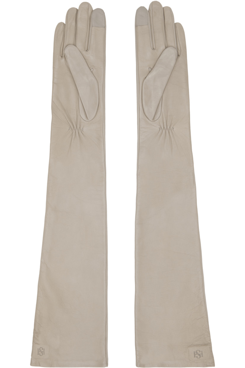 Grained nappa leather opera gloves.

· Elbow-length
· Partially elasticized wrist
· Logo embossed at cuffs
· Full silk jersey lining

Supplier color: Gris Moyen