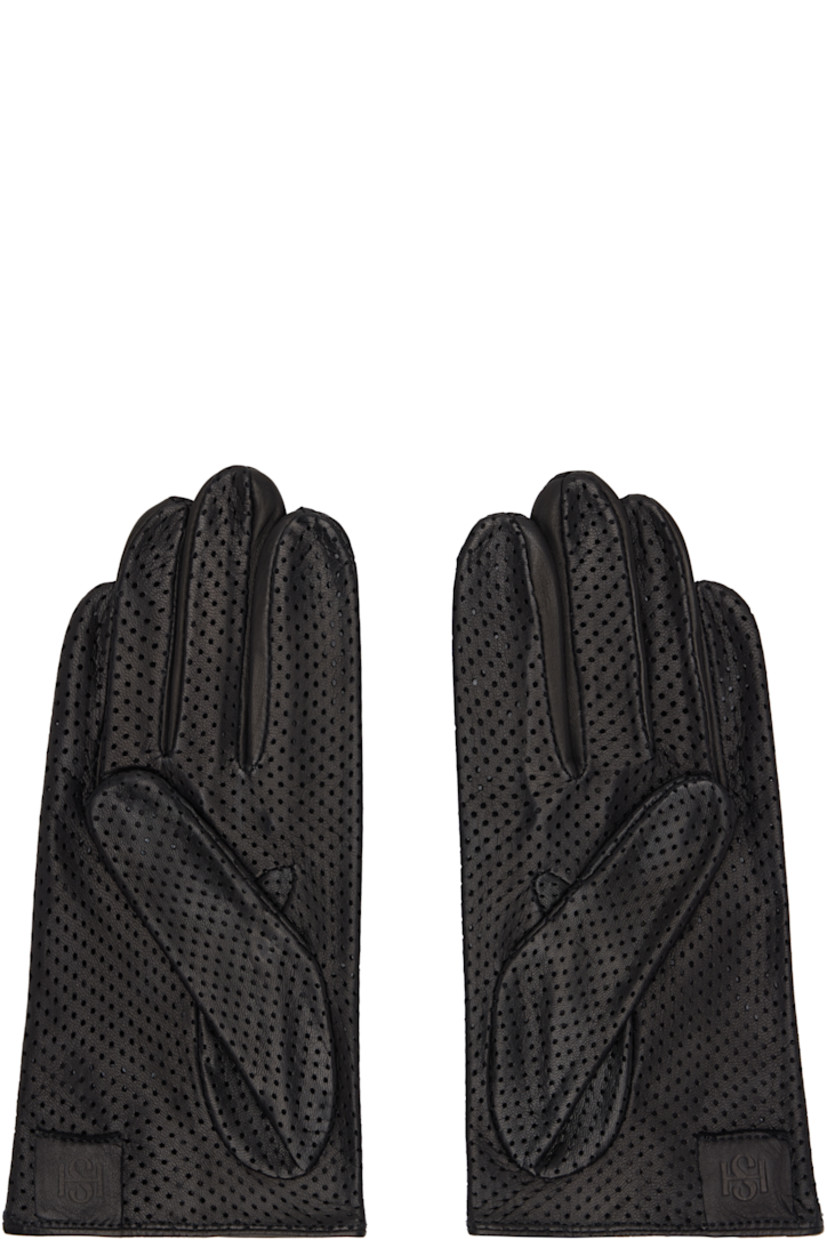 Perforated nappa leather gloves.

· Notch at top wrist
· Embossed logo patch at back wrist
· Suede interior, unlined

Supplier color: Black