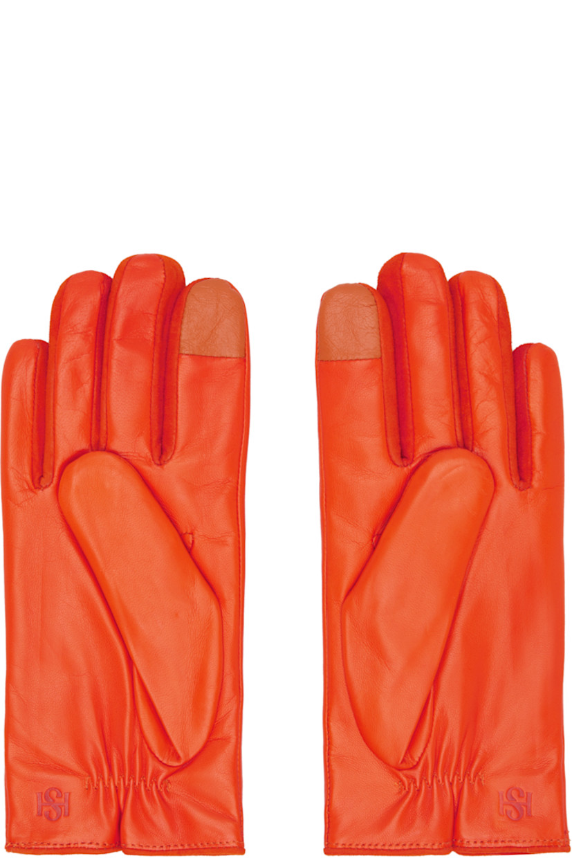 Grained nappa leather gloves.

· Suede trim at fingers
· Partially elasticized wrist
· Notch at top wrist
· Embossed logo at back wrist
· Full knit cashmere-blend lining

Available exclusively at SSENSE.

Supplier color: Burnt Orange