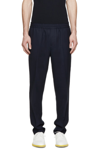 Acne Studios: Navy Wool Ryder Travel Trousers | SSENSE