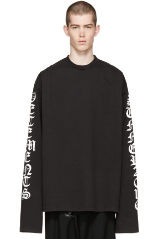 VETEMENTS: Black Oversized Logo Sleeve Pullover | SSENSE