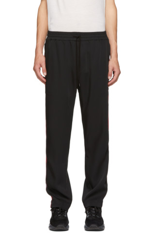 CMMN SWDN: Black & Red Buck Track Pants | SSENSE