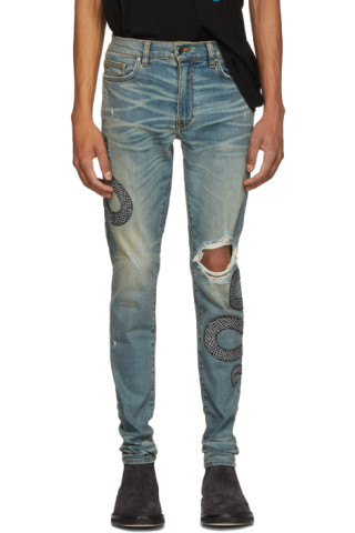 AMIRI: Indigo Glitter Snake Broken Jeans | SSENSE