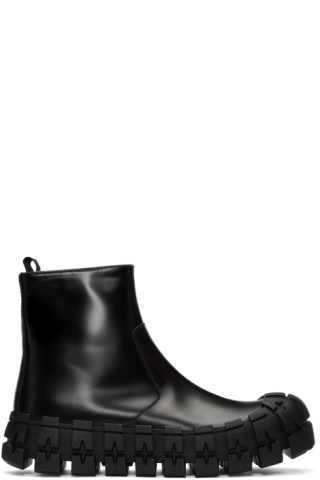 Prada: Black Wheel Sole Zip Boots | SSENSE