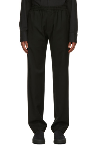 The Row: Black Wool Josh Trousers | SSENSE