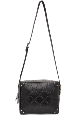 Gucci: Black GG Embossed Messenger Bag | SSENSE