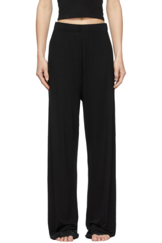 SKIMS: Black Sleep Trousers | SSENSE