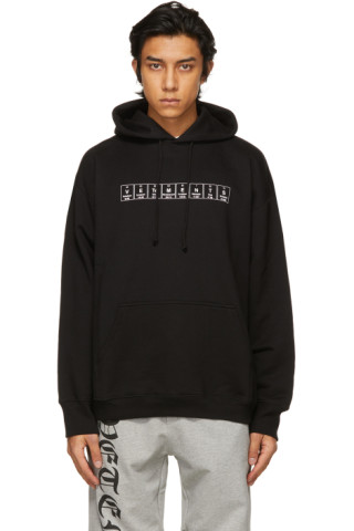 VETEMENTS: Black Chemical Logo Hoodie | SSENSE