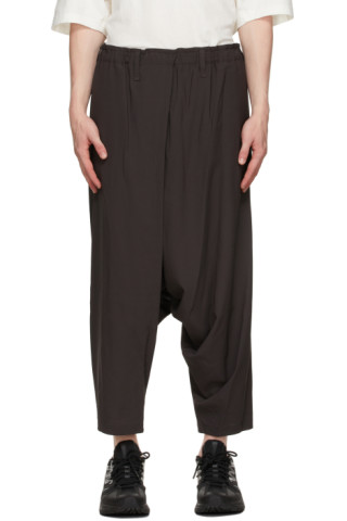 132 5. ISSEY MIYAKE: Grey Seamless Bottom Basic Trousers | SSENSE