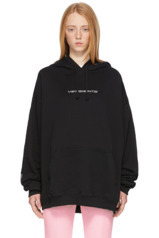 VETEMENTS: Black Logo Tape Hoodie | SSENSE