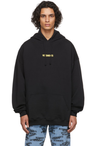 VETEMENTS: Black Logo Label Hoodie | SSENSE