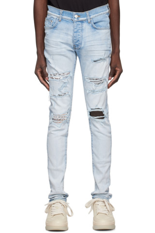 AMIRI: Blue Hibiscus Artpatch Jeans | SSENSE