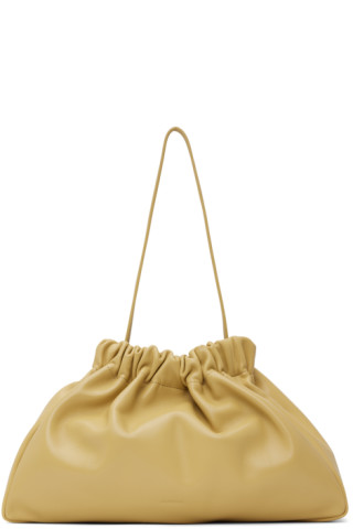 Jil Sander: Tan Scrunch Clutch | SSENSE