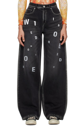 We11done: Black Random Logo Jeans | SSENSE