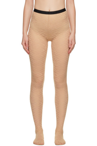 VETEMENTS logo-print semi-sheer Tights - Farfetch