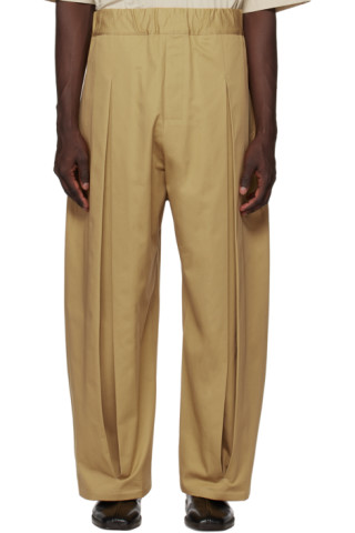 SAGE NATION: Beige Box Pleat Trousers | SSENSE