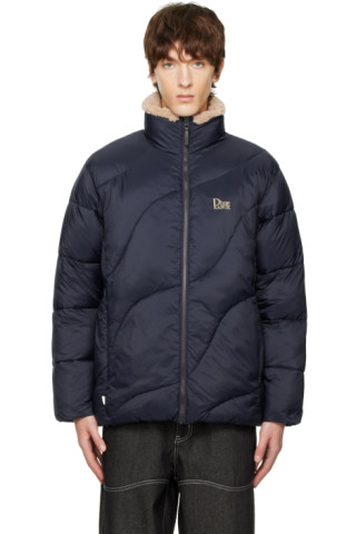 Dime: Navy Kanuk Edition Wavy Puffer Jacket | SSENSE