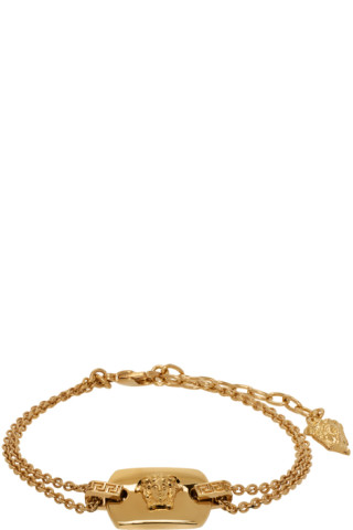 gold tone Medusa rolo chain bracelet