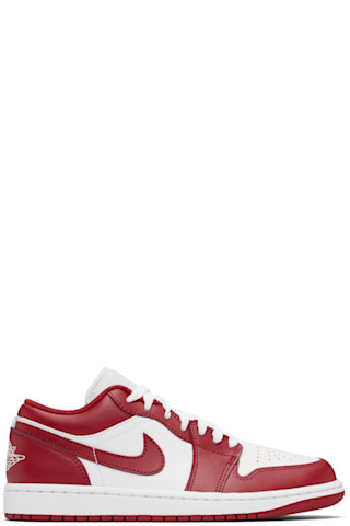red and white low top jordan ones