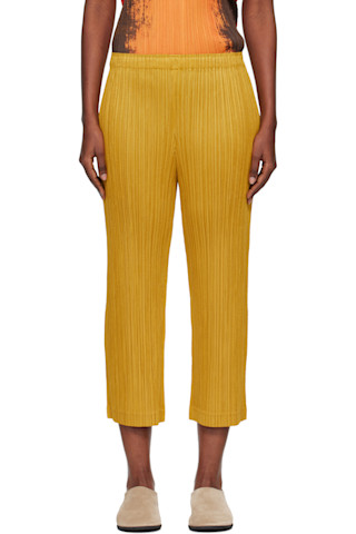 PLEATS PLEASE ISSEY MIYAKE: Yellow Thicker Bottoms 1 Trousers | SSENSE