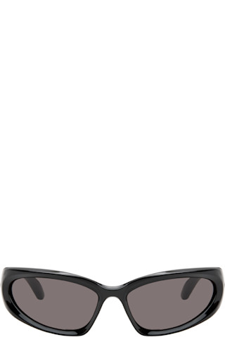 Black Swift Oval Sunglasses by Balenciaga on Sale