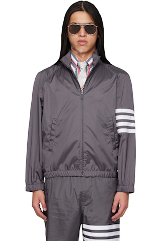 Thom Browne: Gray Shiny Ripstop Raglan 4-Bar Track Jacket | SSENSE