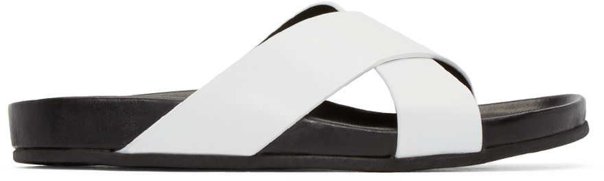 Woman by Common Projects: White & Black Cross Strap Sandals | SSENSE