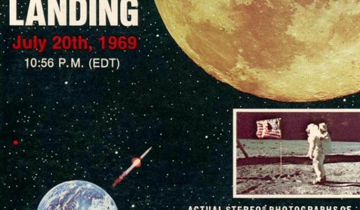 Buzz Aldrin on the moon in front of the US flag