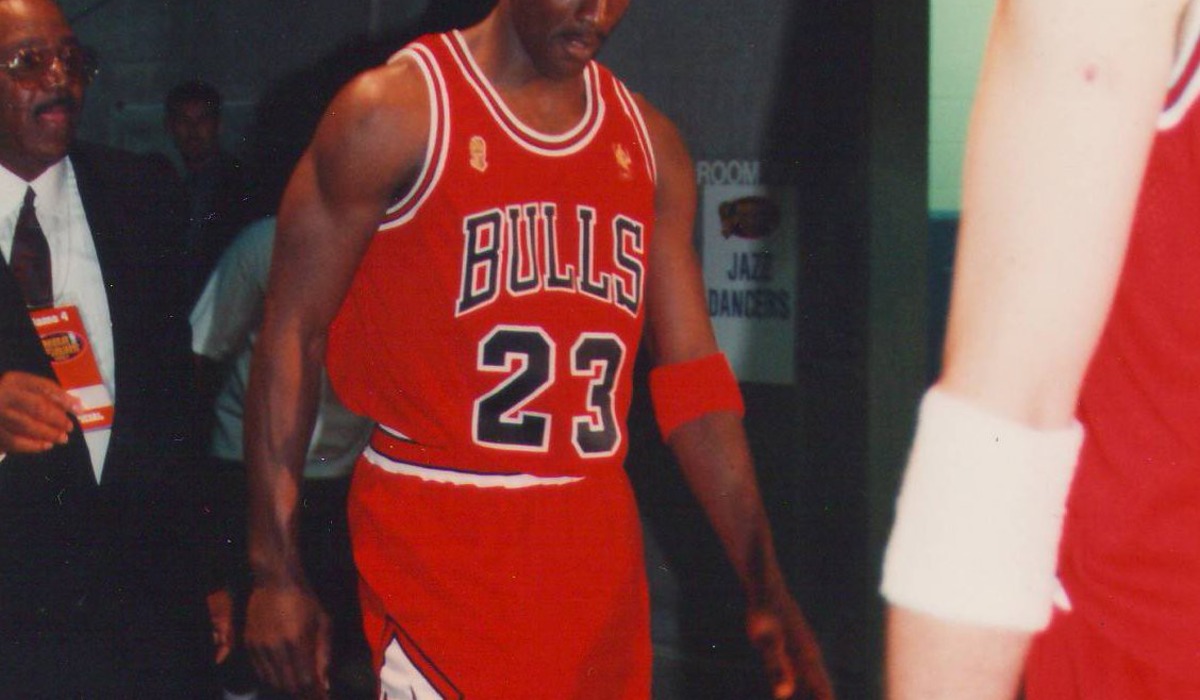 a pair of red, white and black sneakers