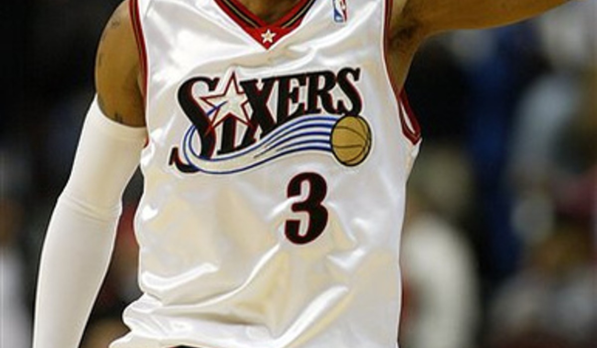 Basketball player is on the floor after a fall