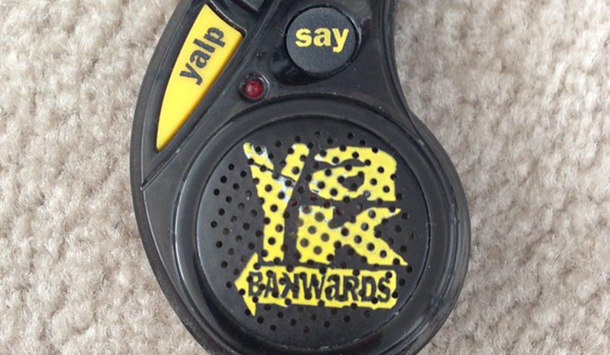 Yellow neon sign reads "yes, and."