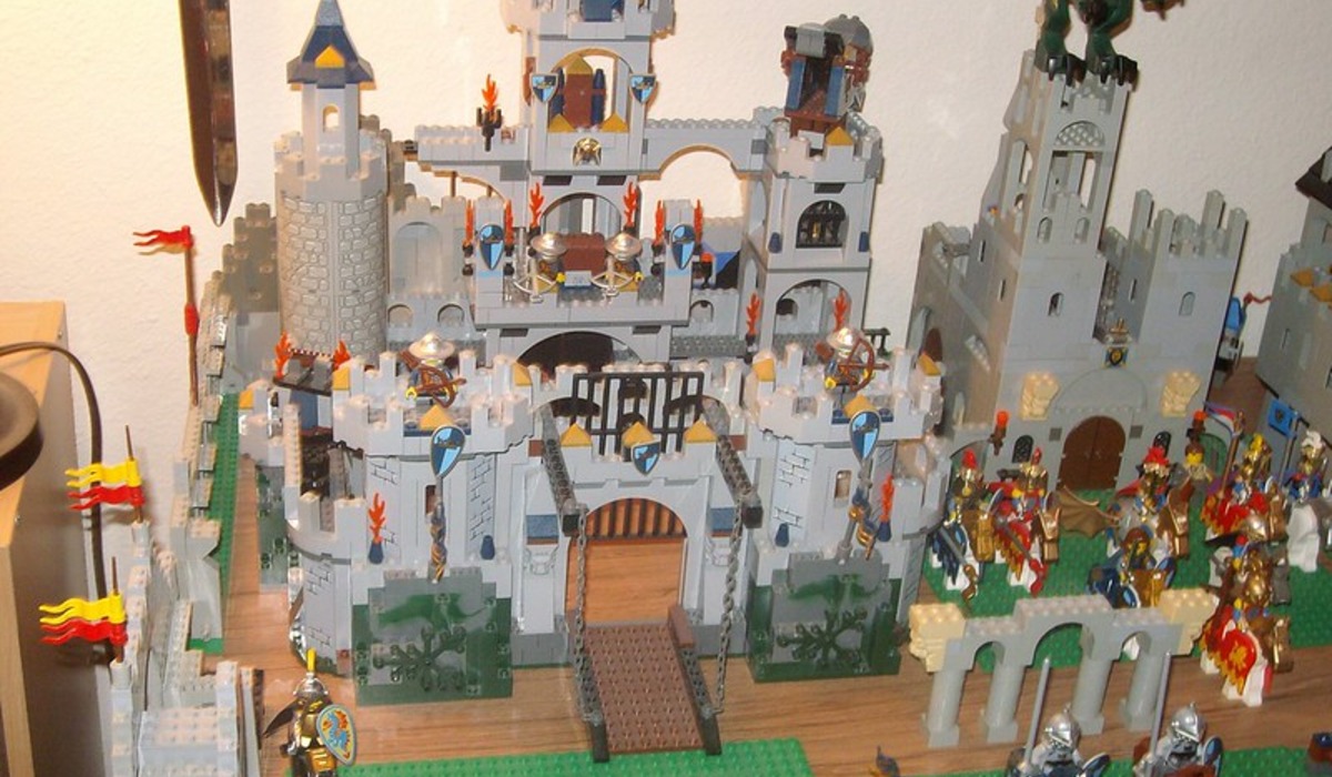 a stone castle with a moat