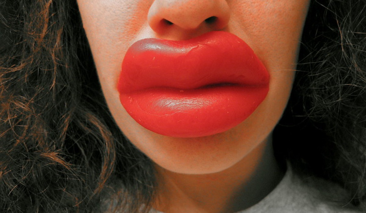 woman with red lipstick and red lipstick