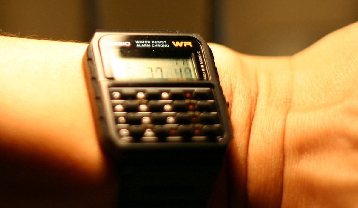 A scientific calculator with its cover open