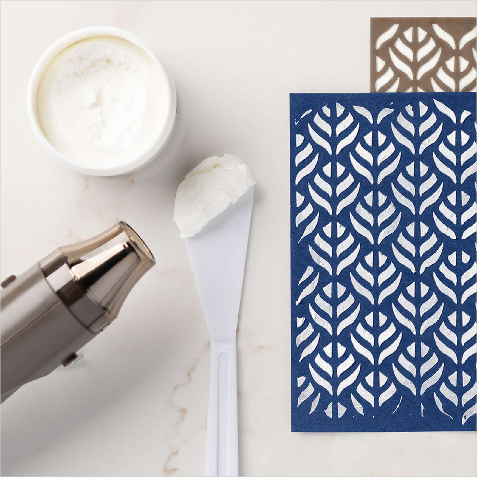 embossing paste - Apply freehand or over decorative masks, then let dry or heat set for easy texture.