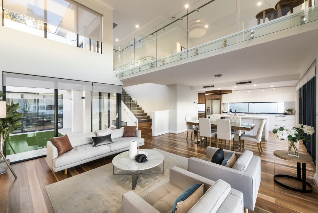 The Capital living room with high ceiling