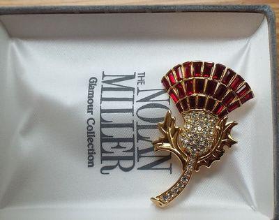 Nolan Miller thistle in original box