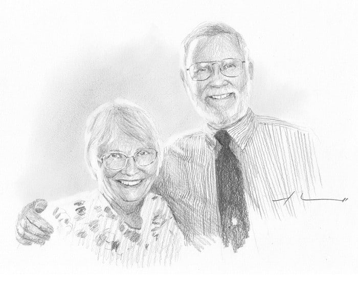 artist couple drawing from a photo by portrait artist Mike Theuer