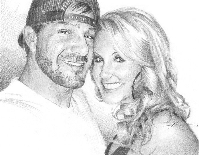happy couple drawing from a photo by portrait artist Mike Theuer