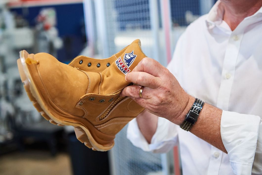 Inspecting a Steel Blue boot from the production line
